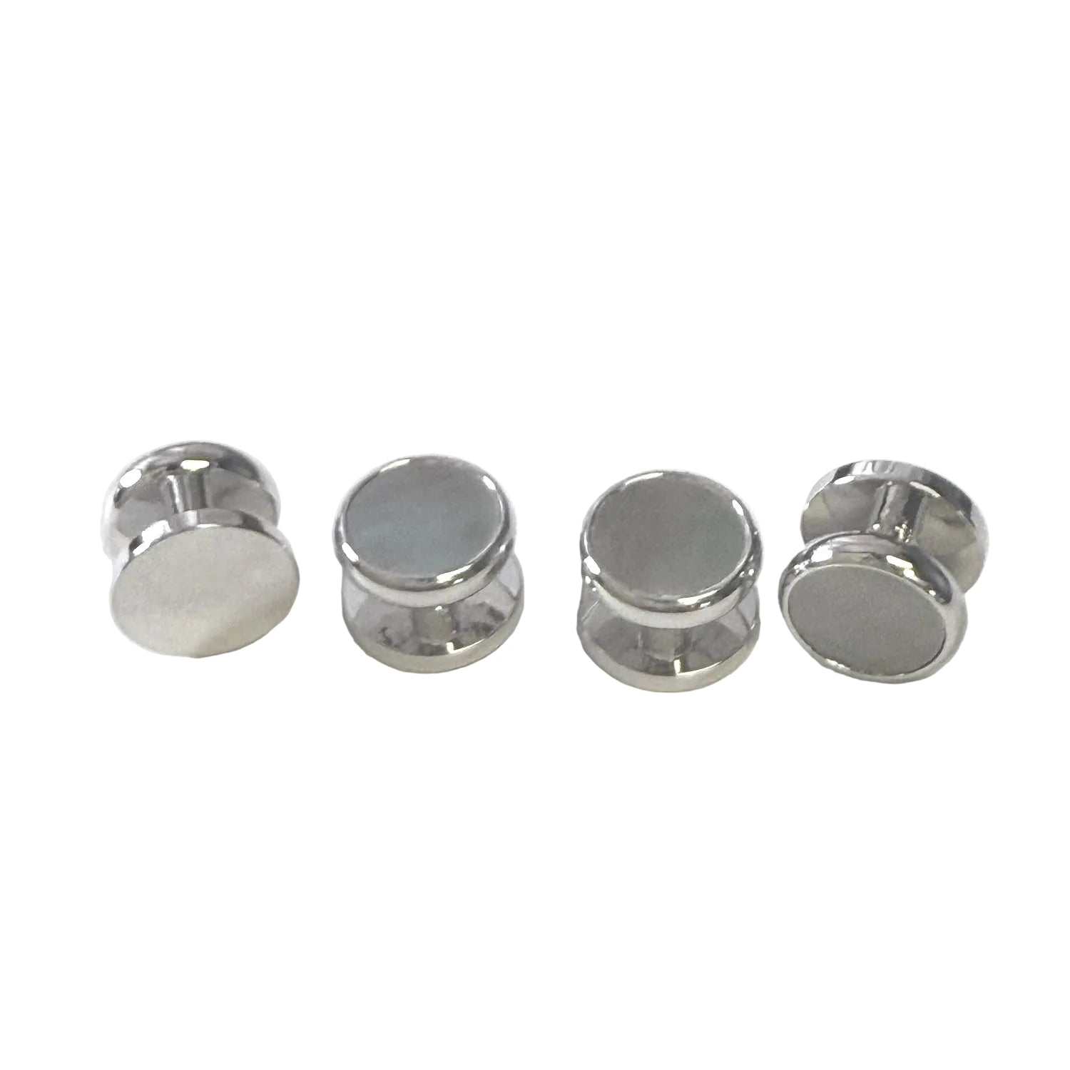 Four silver dark MOP round stud  with flat circular faces, arranged in a row on a white textured fabric background.