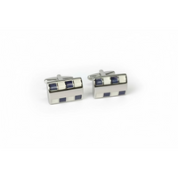 Pair of silver cufflinks with blue accents on a light gray background